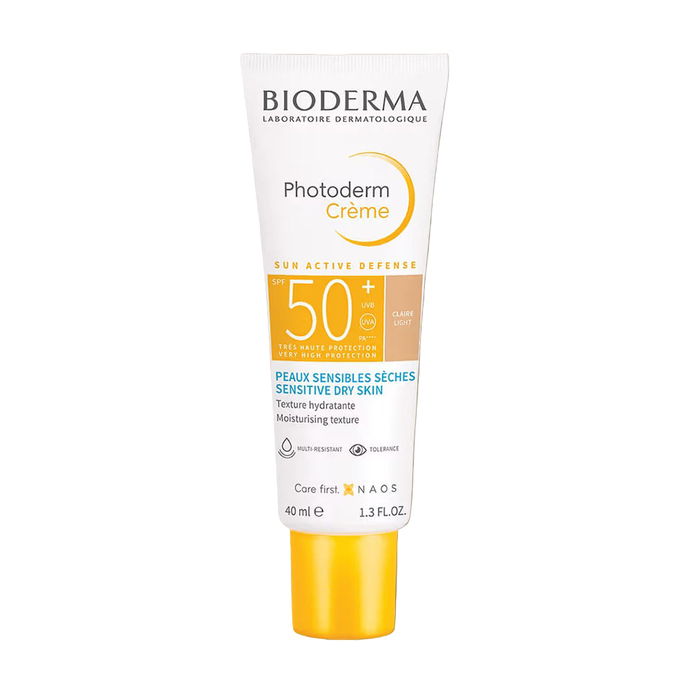 Bioderma Photoderm Crème sun cream tube on a beige background