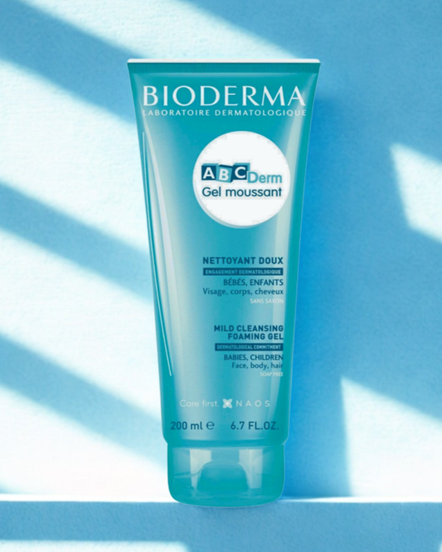 Bioderma ABCDerm Gel moussant tube on a blue background