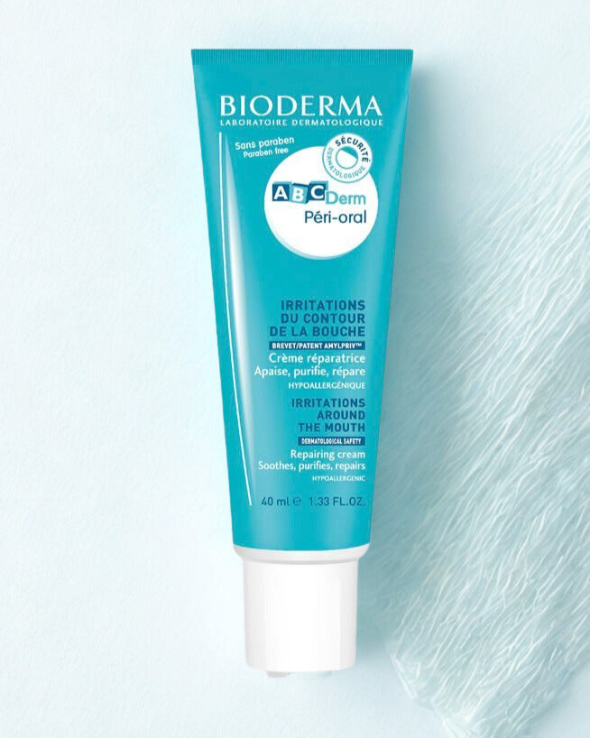 Bioderma ABCDerm Peri-oral cream tube on a light blue background