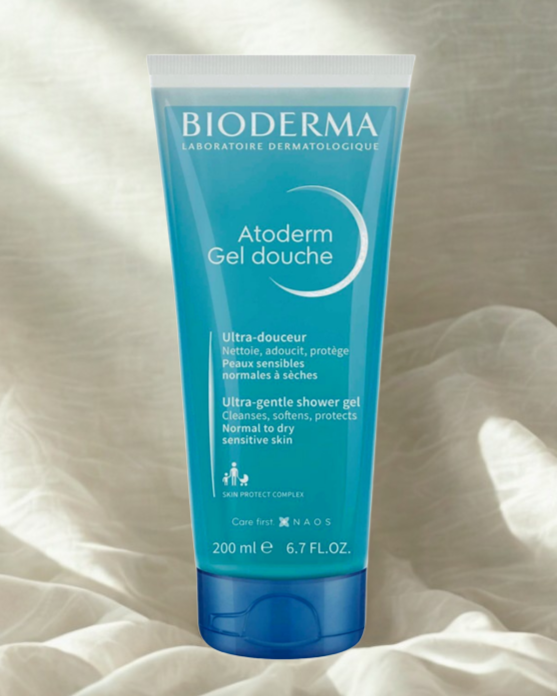 Bioderma Atoderm Gel douche tube on a soft fabric background