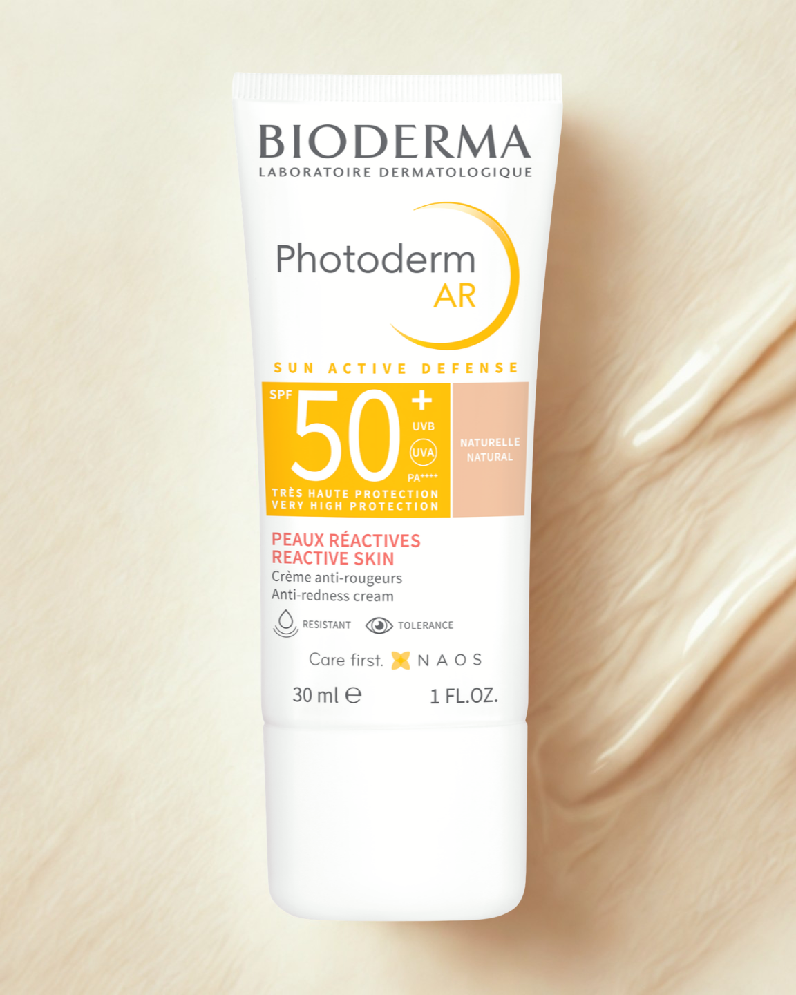 Bioderma Photoderm AR sunscreen tube on a beige background