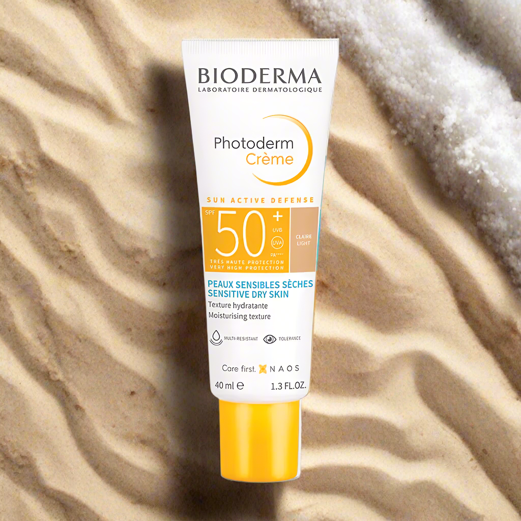 Bioderma Photoderm Crème sunscreen tube on sand
