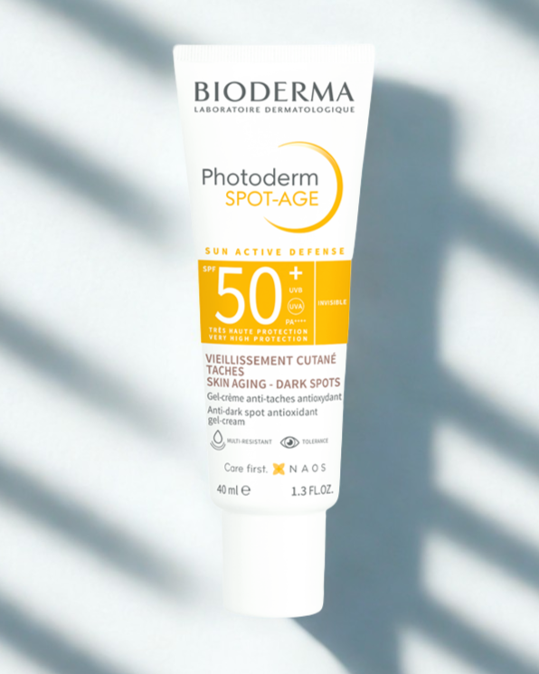 Bioderma Photoderm Spot-Age sunscreen tube on a light background