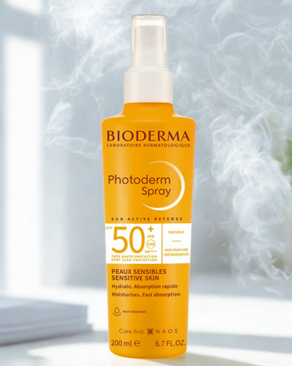 Bioderma Photoderm Spray bottle on a light background