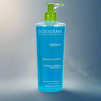 Bioderma Sébium bottle with blue label and green pump on a white background