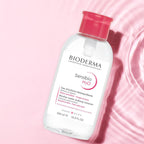 Bioderma Sensibio H2O bottle on a pink background
