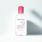 Bioderma Sensibio H2O bottle with pink cap on a light gray background