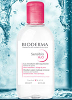 Bioderma Sensibio H2O micellar water bottle with water droplets in the background