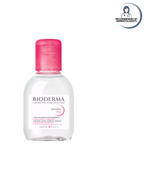 Bioderma bottle with pink cap on a white background