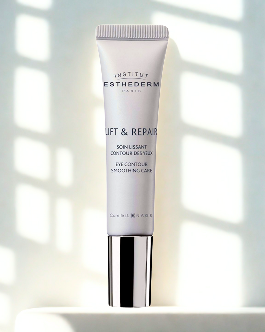 Institut Esthederm Lift & Repair eye cream tube on a white background