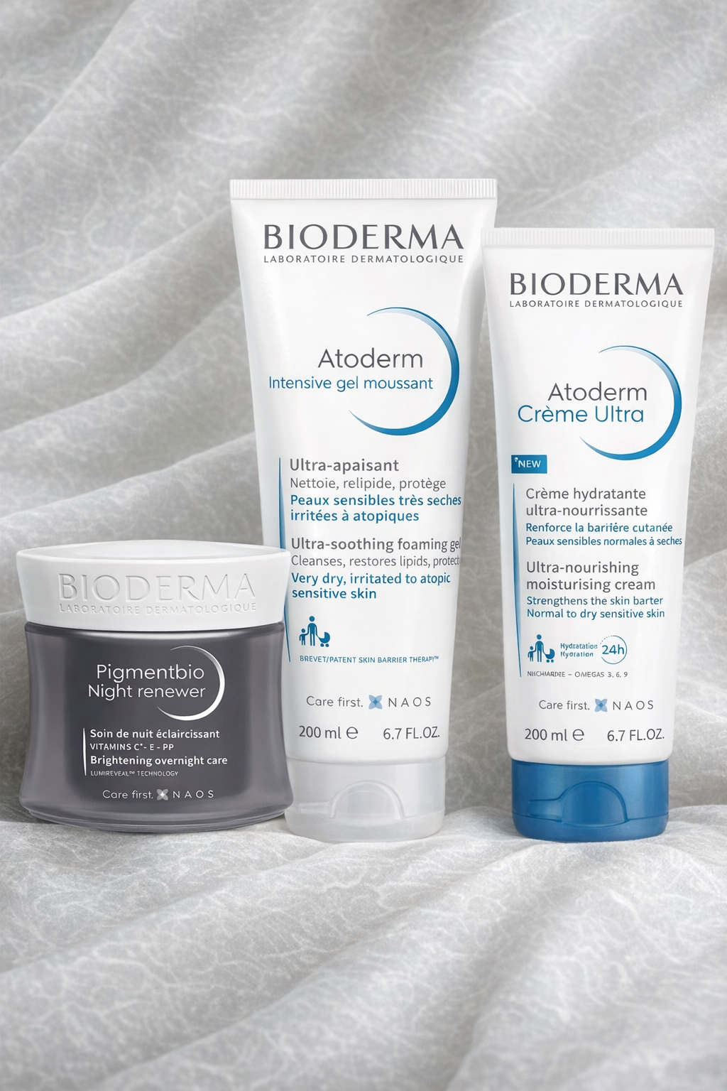 Bioderma skincare products on a textured gray surface